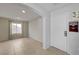 Clean entryway with tile floors, neutral walls and natural light at 2586 Begonia Valley Ave, Henderson, NV 89074