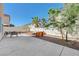 Spacious patio area, perfect for outdoor entertaining with ample seating and a clear blue sky backdrop at 2586 Begonia Valley Ave, Henderson, NV 89074