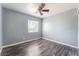 Spacious bedroom featuring a ceiling fan and a bright window at 28 Yellow Flame Ave, North Las Vegas, NV 89084