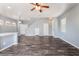 Open living area with hardwood floors and staircase at 28 Yellow Flame Ave, North Las Vegas, NV 89084