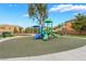 A colorful playground with slides and benches, ideal for Gathering fun and community engagement at 28 Yellow Flame Ave, North Las Vegas, NV 89084