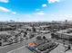 Stunning aerial view of complex with vivid orange tile roofs against Las Vegas skyline at 300 N 14Th St, Las Vegas, NV 89101