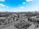 Stunning aerial view of complex with vivid orange tile roofs against Las Vegas skyline at 300 N 14Th St, Las Vegas, NV 89101