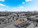 Stunning aerial view of complex with vivid orange tile roofs against Las Vegas skyline at 300 N 14Th St, Las Vegas, NV 89101