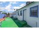 Exterior view of home showing backyard area and multiple entrances at 300 N 14Th St, Las Vegas, NV 89101