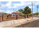 Cozy single-story home with a fenced yard, landscaped with desert landscaping, offering privacy and curb appeal at 300 N 14Th St, Las Vegas, NV 89101