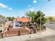 Charming fenced property featuring a well-maintained yard and appealing curb appeal at 300 N 14Th St, Las Vegas, NV 89101