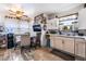 Charming eat-in kitchen featuring a ceiling fan, tile floors, and bright window at 300 N 14Th St, Las Vegas, NV 89101