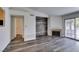 Bright living area featuring modern flooring, a cozy fireplace, and an open layout at 3318 N Decatur Blvd # 2138, Las Vegas, NV 89130