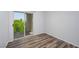 Bright room featuring wood-look floors and a sliding glass door to a balcony at 3550 Bay Sands Dr # 3006, Laughlin, NV 89029