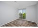 Bright bedroom featuring wood-look floors and a sliding glass door to a balcony at 3550 Bay Sands Dr # 3006, Laughlin, NV 89029