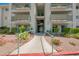 Well-maintained condo complex with walkways, balconies, and manicured landscaping at 3550 Bay Sands Dr # 3006, Laughlin, NV 89029