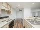 Kitchen with bright lighting, stainless steel sink and a full view of the living room at 3550 Bay Sands Dr # 3006, Laughlin, NV 89029