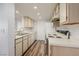 Classic kitchen with updated floors, white appliances and ample counter space at 3550 Bay Sands Dr # 3006, Laughlin, NV 89029