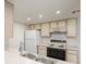 Kitchen featuring white appliances and stainless steel sink at 3550 Bay Sands Dr # 3006, Laughlin, NV 89029