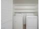 Laundry closet with shelving and a white washer and dryer at 3550 Bay Sands Dr # 3006, Laughlin, NV 89029