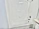 Clean, all-white tiled bathroom featuring a shower and tub combination at 3729 La Junta Dr, Las Vegas, NV 89120