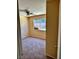 Bedroom with neutral carpet and a window to the backyard at 3729 La Junta Dr, Las Vegas, NV 89120