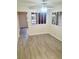Bright dining area with sleek laminate flooring and ample natural light at 3729 La Junta Dr, Las Vegas, NV 89120