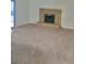 Spacious carpeted living area featuring a brick fireplace at 3729 La Junta Dr, Las Vegas, NV 89120