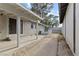 The backyard offers a large patio space with both covered and uncovered areas at 3936 Applecrest St, Las Vegas, NV 89108