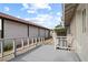 View of the backyard wooden deck with access to the side yard and the house at 3936 Applecrest St, Las Vegas, NV 89108