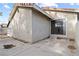 The back of the house has a concrete patio with a sliding glass door entrance to the house at 3936 Applecrest St, Las Vegas, NV 89108