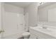 Bathroom with a shower-tub combo, toilet, and vanity with chrome fixtures at 3936 Applecrest St, Las Vegas, NV 89108
