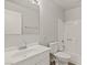 Clean bathroom with a white sink, mirror, toilet, and shower with bathtub at 3936 Applecrest St, Las Vegas, NV 89108