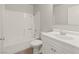 Bathroom featuring a tub-shower combo, vanity and tile flooring at 3936 Applecrest St, Las Vegas, NV 89108