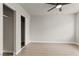 Bedroom featuring hardwood floors, a ceiling fan, and closet at 3936 Applecrest St, Las Vegas, NV 89108