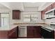 Well-equipped kitchen area featuring stainless steel appliances and ample counter space at 3936 Applecrest St, Las Vegas, NV 89108