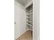 Pantry with white shelves and tile flooring at 3936 Applecrest St, Las Vegas, NV 89108