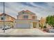 Charming two-story home featuring a two-car garage and neutral stucco finish with a lovely red tile roof at 420 Clifton Heights Dr, Las Vegas, NV 89145