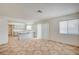 Open kitchen area with an eat-in bar and access to the living area and backyard at 420 Clifton Heights Dr, Las Vegas, NV 89145
