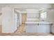 Functional kitchen with tile countertops, ample cabinet space, and matching white appliances at 420 Clifton Heights Dr, Las Vegas, NV 89145