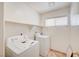 Convenient laundry room with modern washer and dryer at 420 Clifton Heights Dr, Las Vegas, NV 89145