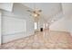 Inviting living area featuring a fireplace, vaulted ceilings, and large windows for natural light at 420 Clifton Heights Dr, Las Vegas, NV 89145