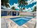Backyard oasis featuring a refreshing pool, and covered patio perfect for outdoor relaxation at 4425 Sherrill Ave, Las Vegas, NV 89110