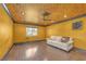 Inviting living room with modern ceiling fan and stylish textured ceiling above hardwood floors at 4425 Sherrill Ave, Las Vegas, NV 89110