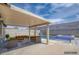 Outdoor patio features comfortable couches with the pool in the background at 4425 Sherrill Ave, Las Vegas, NV 89110