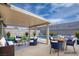 This covered patio features stylish seating areas and a pool, perfect for outdoor relaxation and entertaining at 4425 Sherrill Ave, Las Vegas, NV 89110