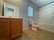 Bathroom with a shower-tub combination and a light wood vanity at 4749 Golden Shimmer Ave, Las Vegas, NV 89139
