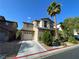 Exterior view of a two-story house with an attached garage and a tidy front yard under a blue sky at 4749 Golden Shimmer Ave, Las Vegas, NV 89139