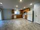 Eat-in kitchen featuring wood cabinets, white appliances, recessed lighting, and tiled floors at 4749 Golden Shimmer Ave, Las Vegas, NV 89139