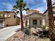 Charming single-story home with desert landscaping and a covered porch, perfect for enjoying the outdoors at 5524 Markley Ave, Las Vegas, NV 89141