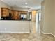Bright kitchen with stainless steel appliances, granite countertops, and ample cabinet space for storage at 5524 Markley Ave, Las Vegas, NV 89141