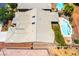 Aerial view of a backyard pool nestled in a residential neighborhood at 5586 Golden Leaf Ave, Las Vegas, NV 89122