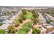 Beautiful aerial view of houses surrounding the lush golf course and mature trees at 5586 Golden Leaf Ave, Las Vegas, NV 89122
