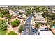 Aerial view of a well-maintained neighborhood with mature trees and manicured lawns, showcasing a peaceful and established community at 5586 Golden Leaf Ave, Las Vegas, NV 89122